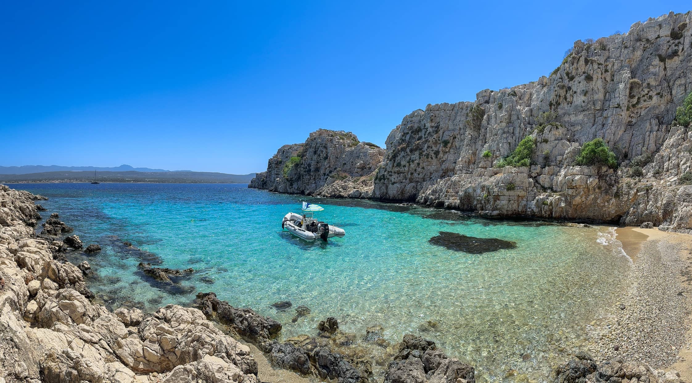 Proti island turquoise waters at Vourlia beach